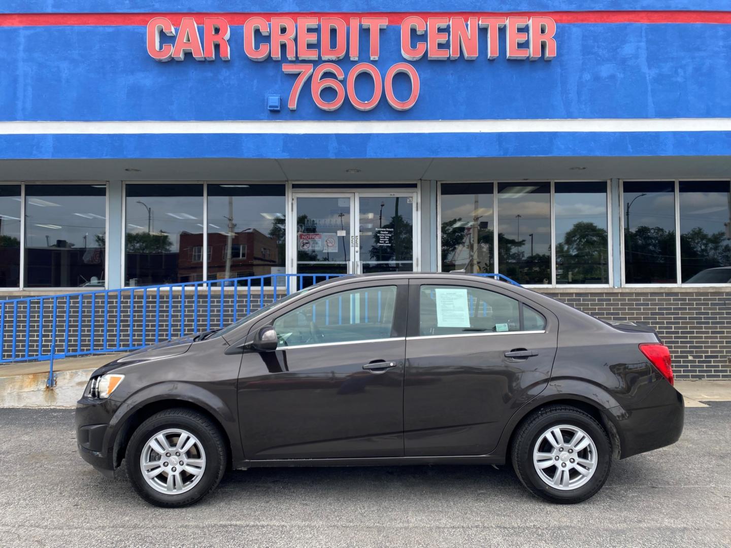 2014 BRONZE Chevrolet Sonic LT Auto Sedan (1G1JC5SH7E4) with an 1.8L L4 DOHC 24V engine, 6-Speed Automatic transmission, located at 7600 S Western Ave., Chicago, IL, 60620, (773) 918-3980, 0.000000, 0.000000 - Photo#0