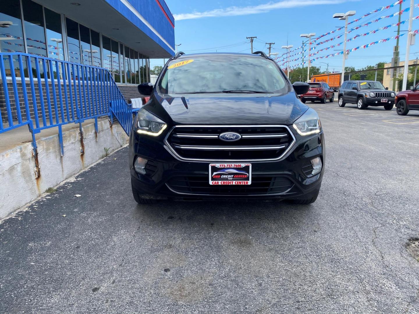 2017 BLACK Ford Escape SE 4WD (1FMCU9GD7HU) with an 1.5L L4 DOHC 16V engine, 6A transmission, located at 7600 S Western Ave., Chicago, IL, 60620, (773) 918-3980, 0.000000, 0.000000 - Photo#1