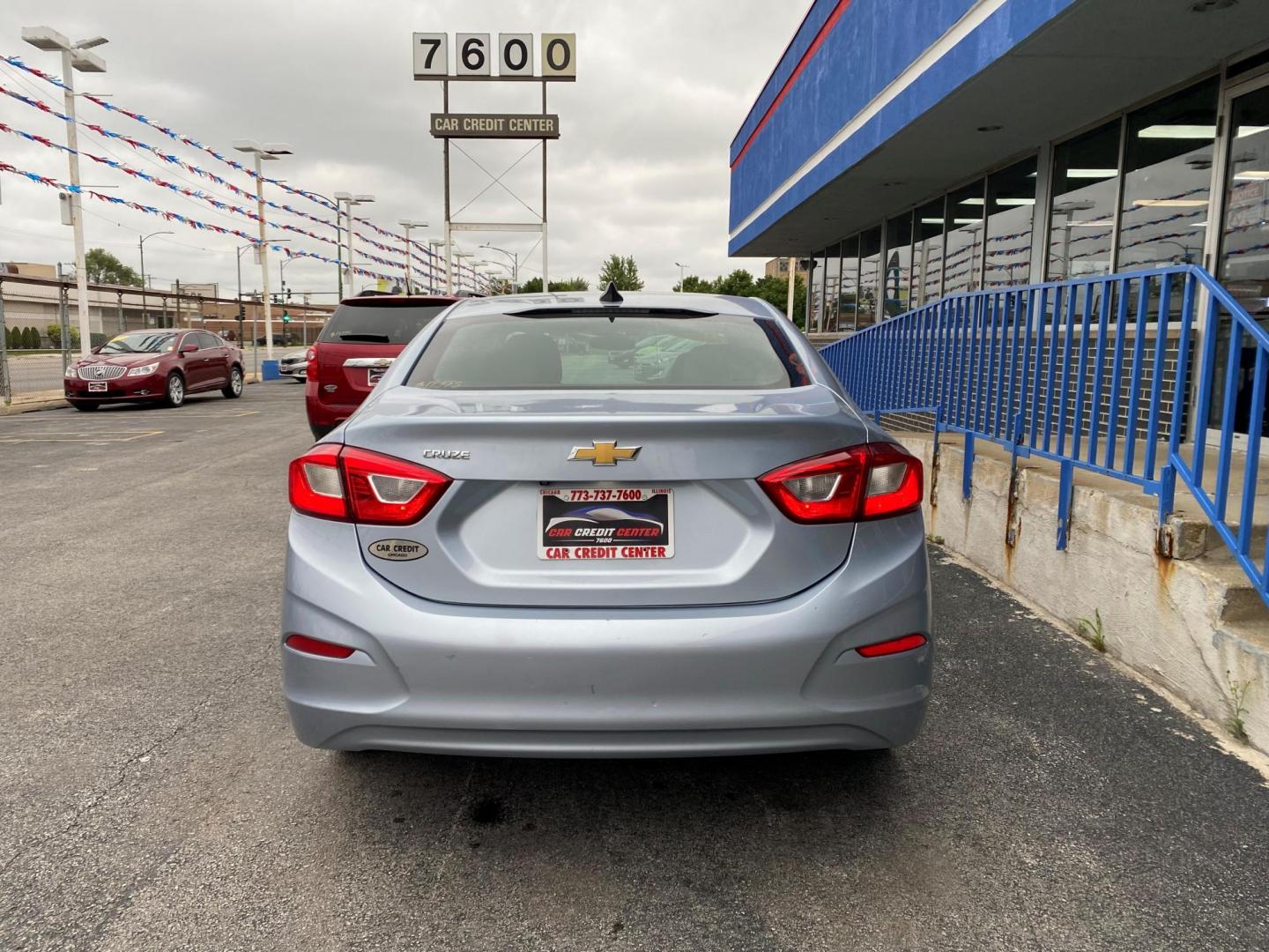 2018 BLUE Chevrolet Cruze LS Auto (1G1BC5SM4J7) with an 1.4L L4 DOHC 16V TURBO engine, 6A transmission, located at 7600 S Western Ave., Chicago, IL, 60620, (773) 918-3980, 0.000000, 0.000000 - Photo#2