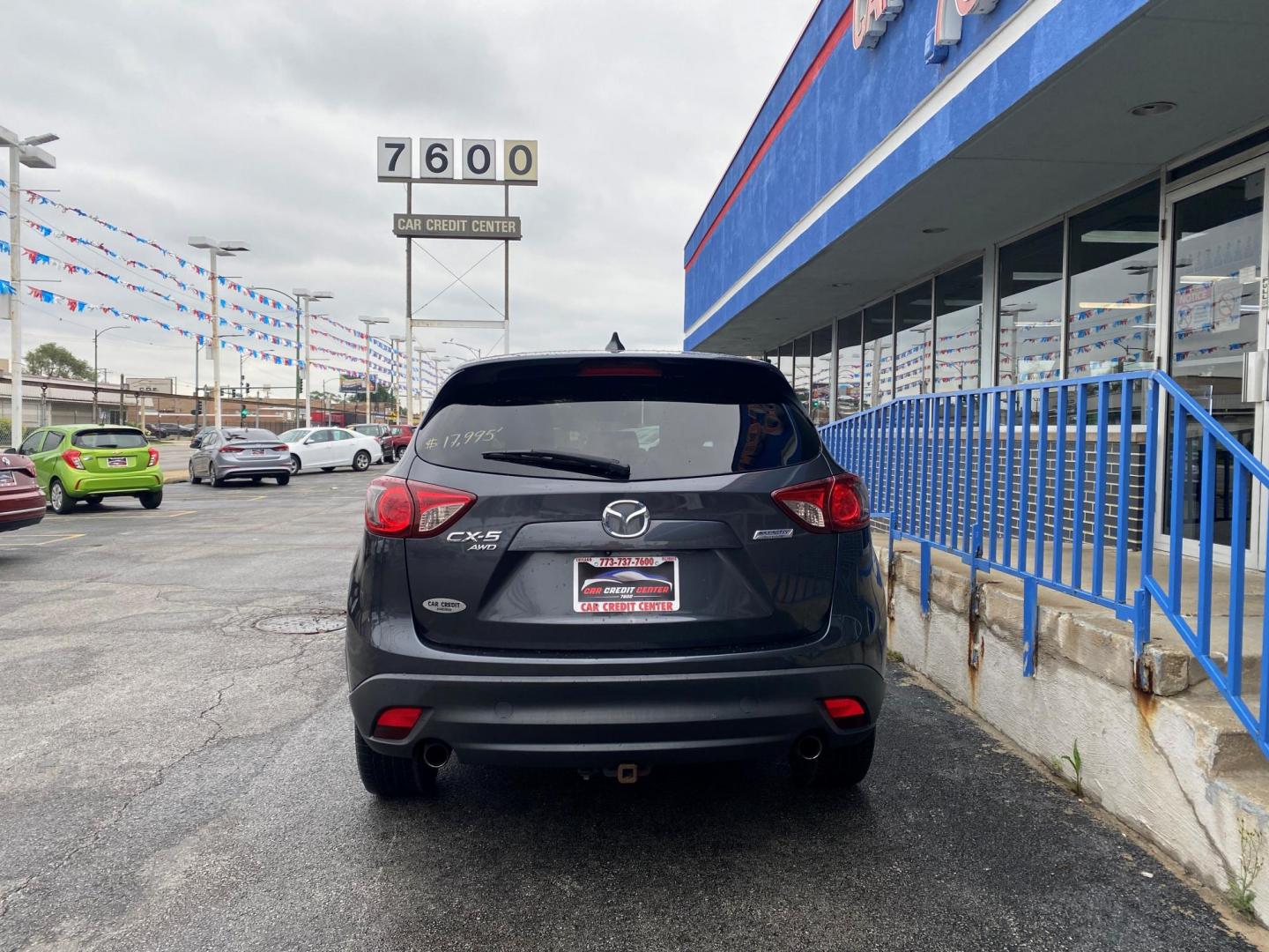 2015 GRAY Mazda CX-5 Grand Touring AWD (JM3KE4DY6F0) with an 2.5L L4 DOHC 16V engine, 6-Speed Automatic transmission, located at 7600 S Western Ave., Chicago, IL, 60620, (773) 918-3980, 0.000000, 0.000000 - Photo#2