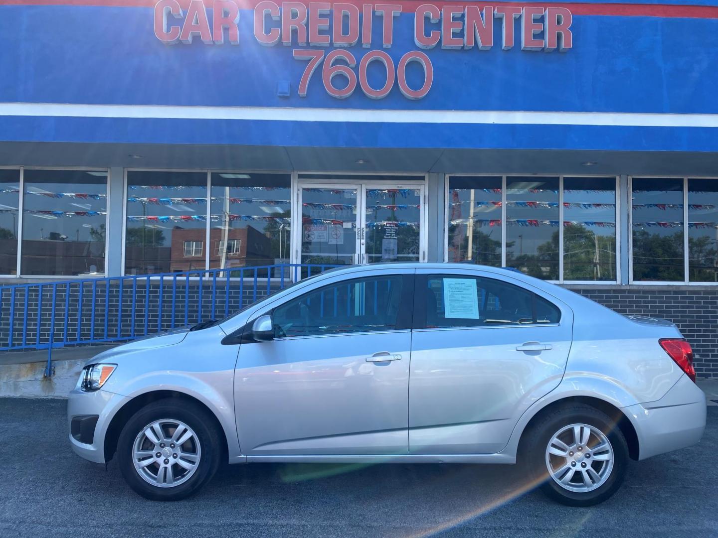 2014 SILVER Chevrolet Sonic LT Auto Sedan (1G1JC5SHXE4) with an 1.8L L4 DOHC 24V engine, 6-Speed Automatic transmission, located at 7600 S Western Ave., Chicago, IL, 60620, (773) 918-3980, 0.000000, 0.000000 - Photo#0