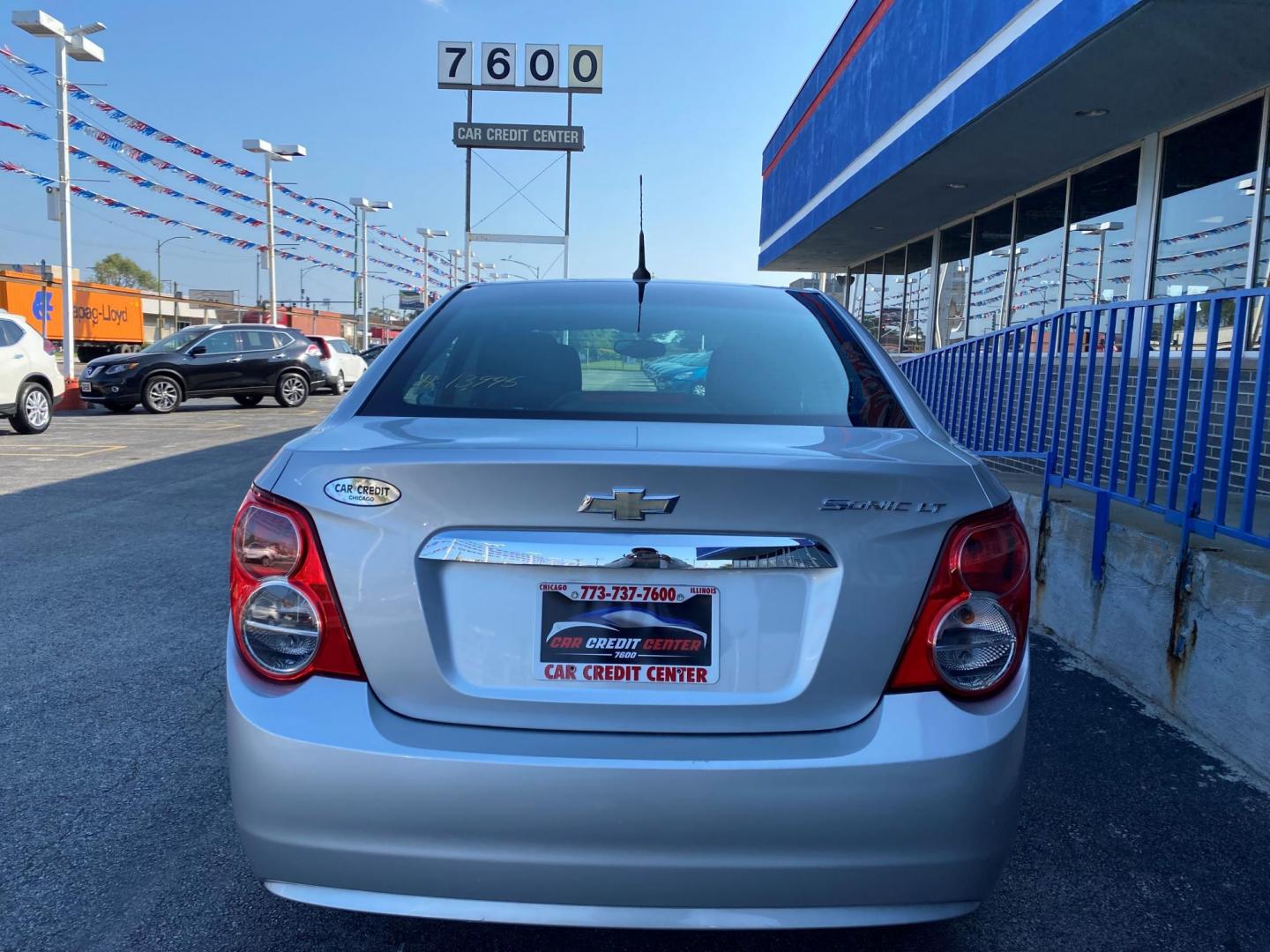 2014 SILVER Chevrolet Sonic LT Auto Sedan (1G1JC5SHXE4) with an 1.8L L4 DOHC 24V engine, 6-Speed Automatic transmission, located at 7600 S Western Ave., Chicago, IL, 60620, (773) 918-3980, 0.000000, 0.000000 - Photo#2