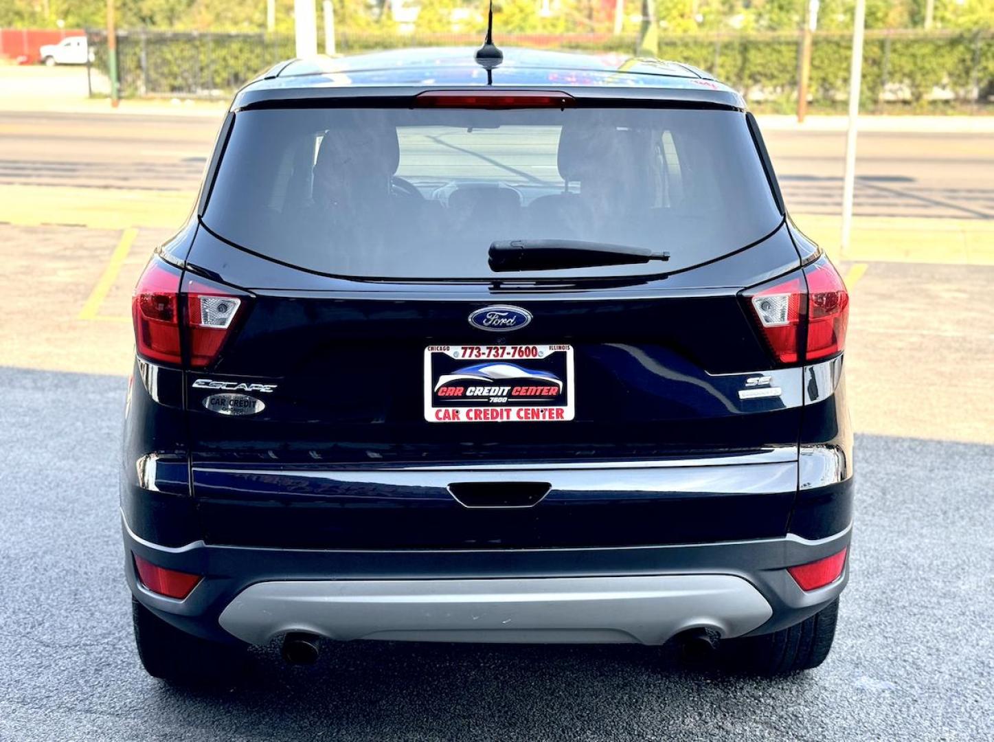 2019 BLACK Ford Escape SE FWD (1FMCU0GDXKU) with an 1.5L L4 DOHC 16V engine, 6A transmission, located at 7600 S Western Ave., Chicago, IL, 60620, (773) 918-3980, 0.000000, 0.000000 - Photo#3