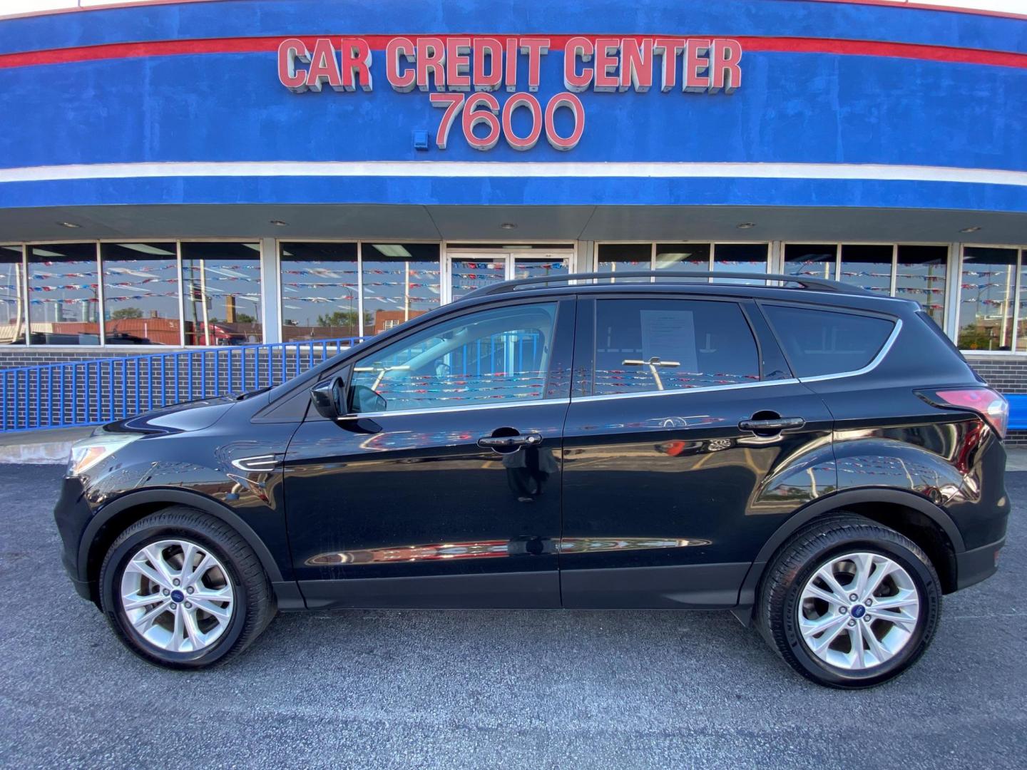 2018 BLACK Ford Escape SE FWD (1FMCU0GD2JU) with an 1.5L L4 DOHC 16V engine, 6A transmission, located at 7600 S Western Ave., Chicago, IL, 60620, (773) 918-3980, 0.000000, 0.000000 - Photo#0