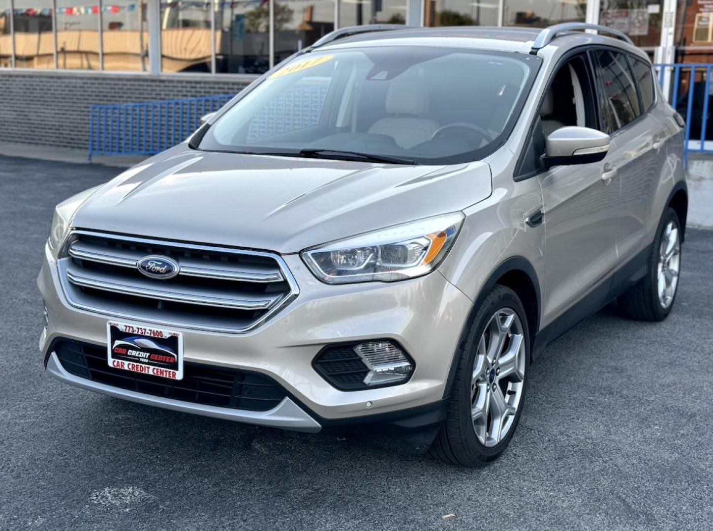 2017 GOLD Ford Escape Titanium FWD (1FMCU0J95HU) with an 2.0L L4 DOHC 16V engine, 6A transmission, located at 7600 S Western Ave., Chicago, IL, 60620, (773) 918-3980, 0.000000, 0.000000 - Photo#2