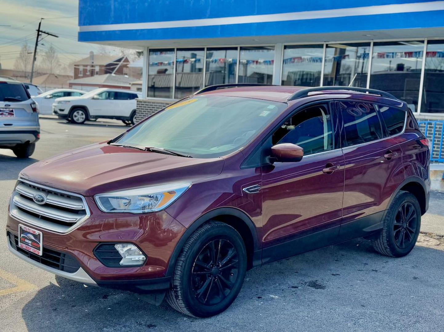 2018 RED Ford Escape SE FWD (1FMCU0GD7JU) with an 1.5L L4 DOHC 16V engine, 6A transmission, located at 7600 S Western Ave., Chicago, IL, 60620, (773) 918-3980, 0.000000, 0.000000 - Photo#2