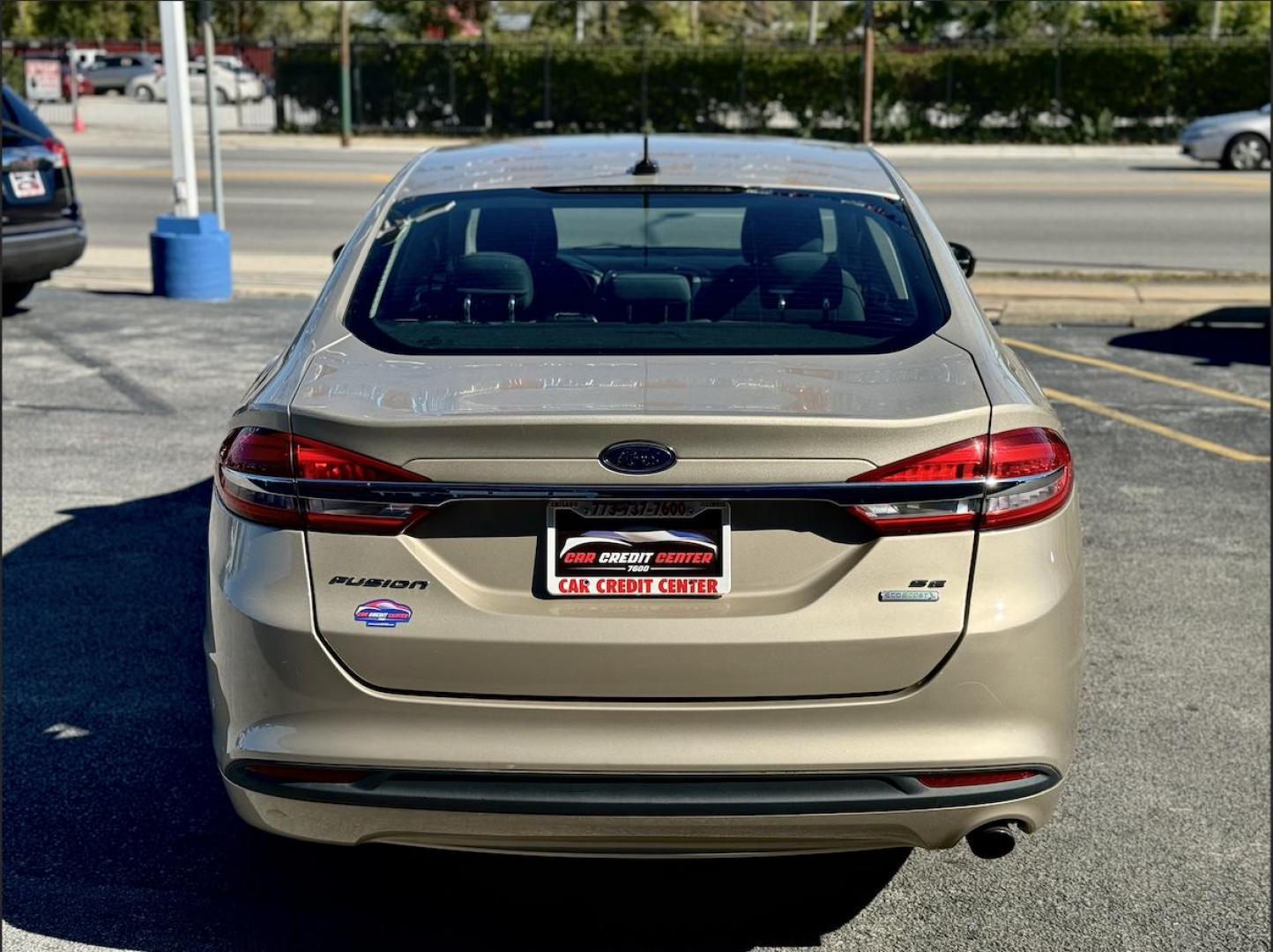 2017 GOLD Ford Fusion SE (3FA6P0HD1HR) with an 1.5L L4 DOHC 16V engine, 6A transmission, located at 7600 S Western Ave., Chicago, IL, 60620, (773) 918-3980, 0.000000, 0.000000 - Photo#3