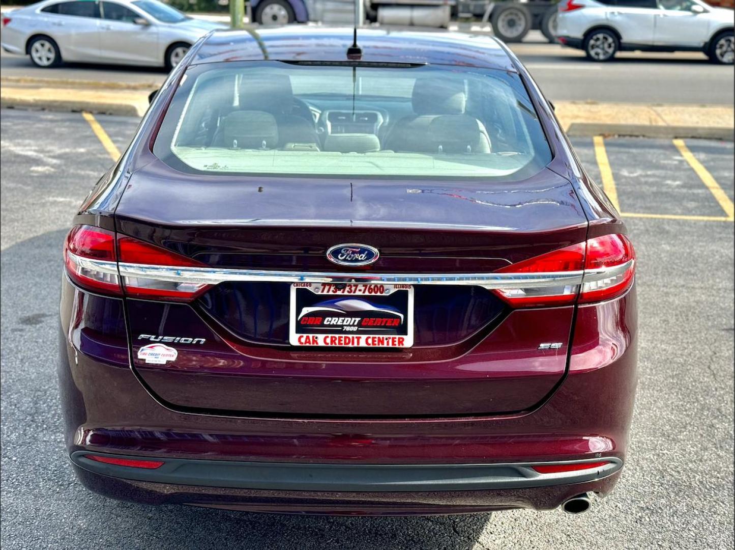 2017 RED Ford Fusion SE (3FA6P0H73HR) with an 2.5L L4 DOHC 16V engine, 6A transmission, located at 7600 S Western Ave., Chicago, IL, 60620, (773) 918-3980, 0.000000, 0.000000 - Photo#3