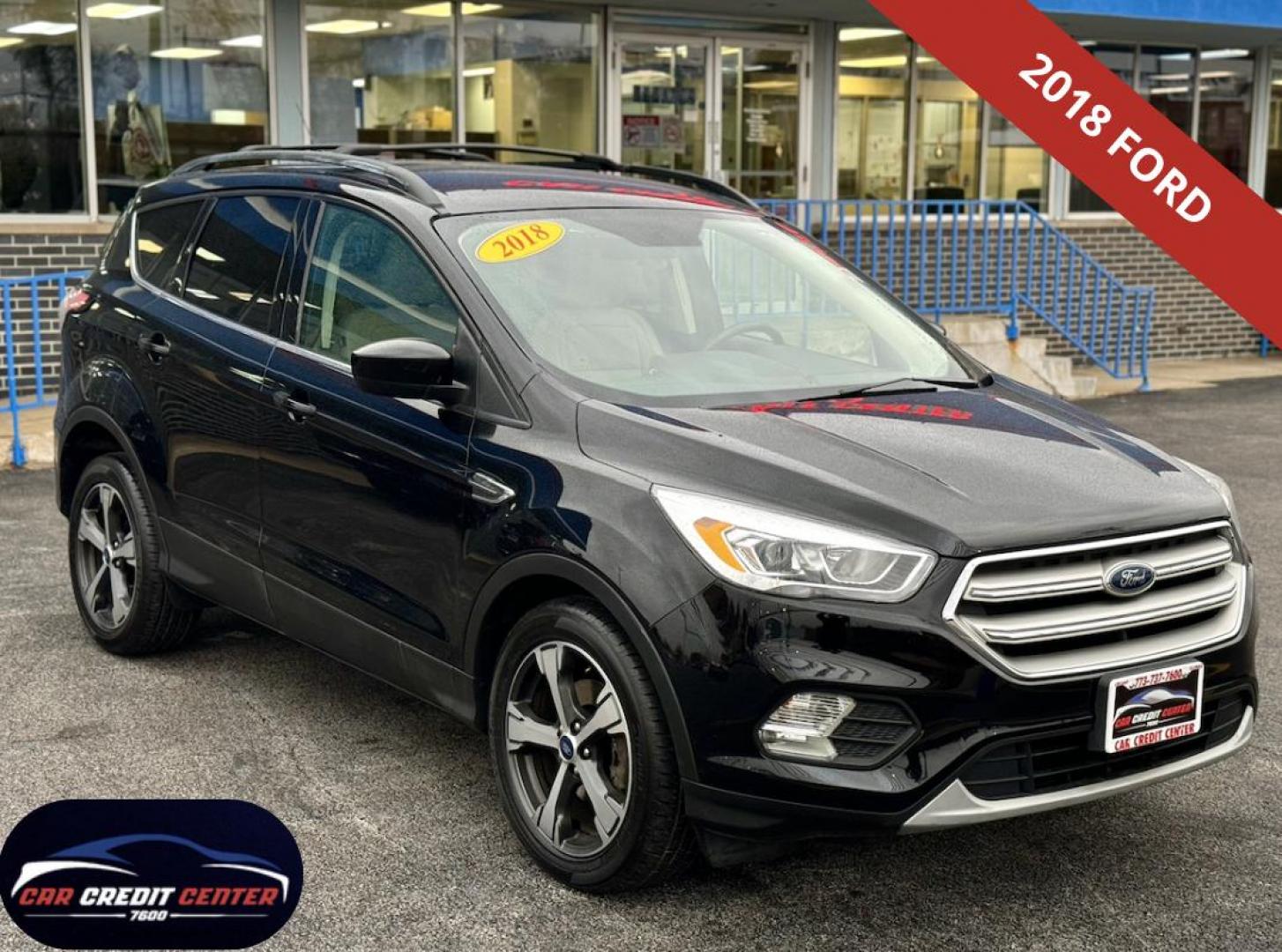 2018 BLACK Ford Escape SEL FWD (1FMCU0HD3JU) with an 1.5L L4 DOHC 16V engine, 6A transmission, located at 7600 S Western Ave., Chicago, IL, 60620, (773) 918-3980, 0.000000, 0.000000 - Photo#0