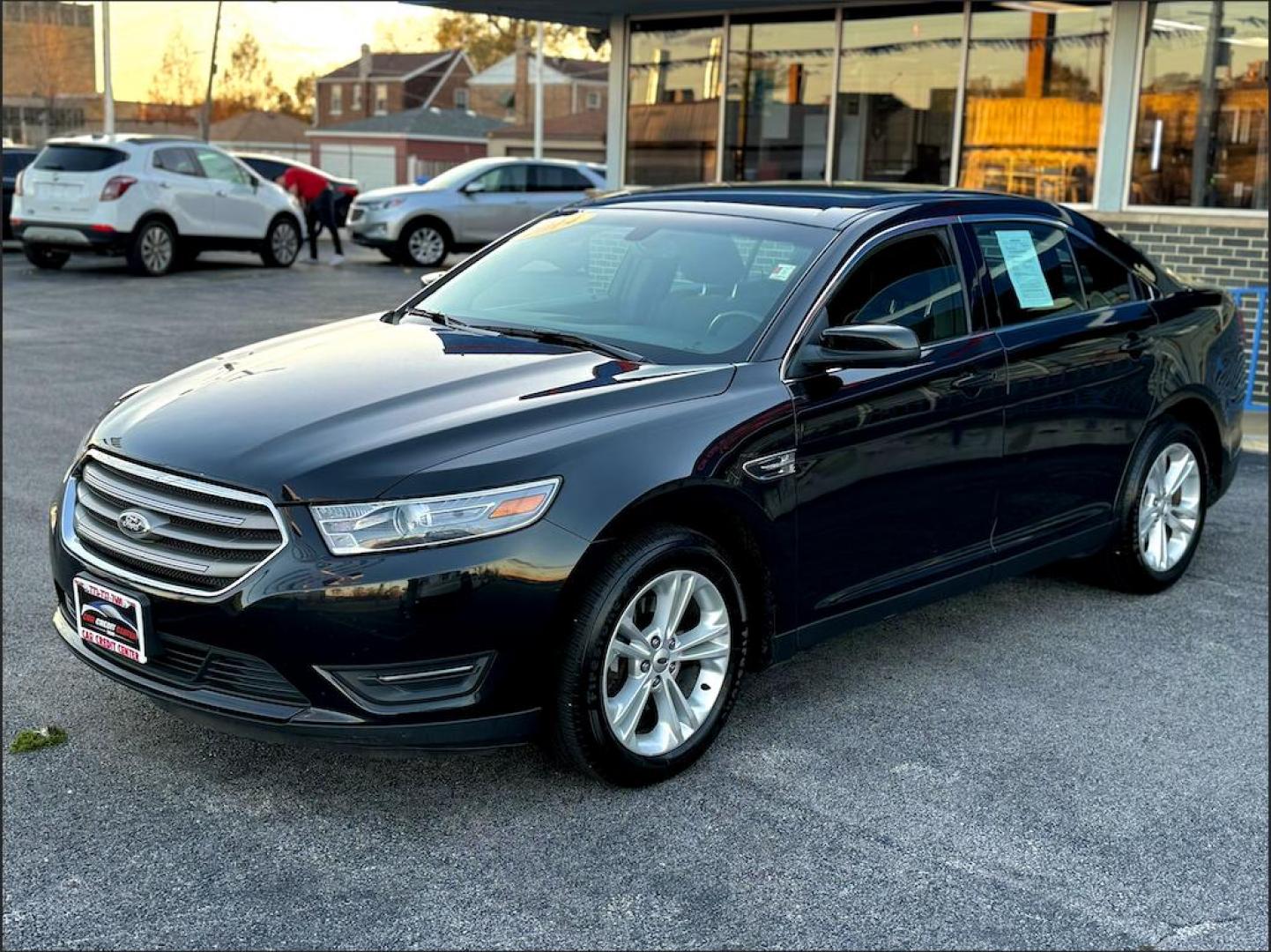 2014 BLACK Ford Taurus SEL FWD (1FAHP2E86EG) with an 3.5L V6 DOHC 24V engine, 6-Speed Automatic transmission, located at 7600 S Western Ave., Chicago, IL, 60620, (773) 918-3980, 0.000000, 0.000000 - Photo#2