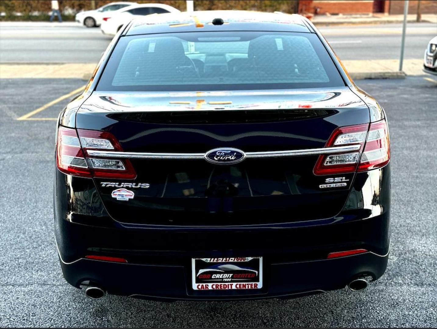 2014 BLACK Ford Taurus SEL FWD (1FAHP2E86EG) with an 3.5L V6 DOHC 24V engine, 6-Speed Automatic transmission, located at 7600 S Western Ave., Chicago, IL, 60620, (773) 918-3980, 0.000000, 0.000000 - Photo#3