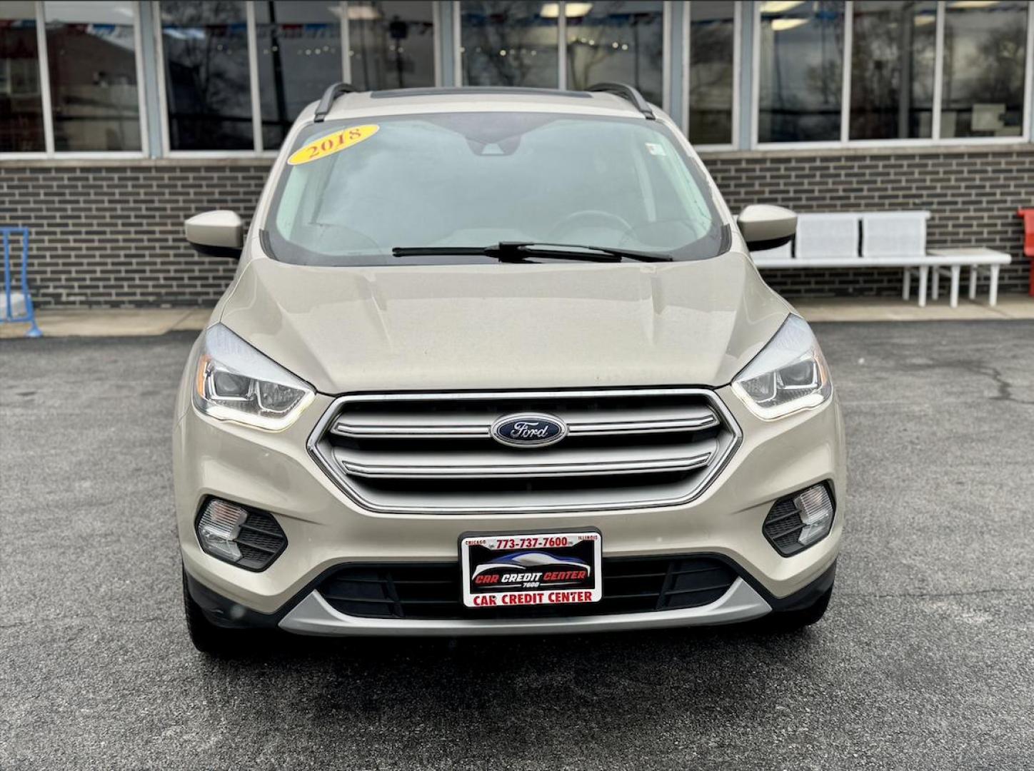 2018 TAN Ford Escape SEL 4WD (1FMCU9HD0JU) with an 1.5L L4 DOHC 16V engine, 6A transmission, located at 7600 S Western Ave., Chicago, IL, 60620, (773) 918-3980, 0.000000, 0.000000 - Photo#1