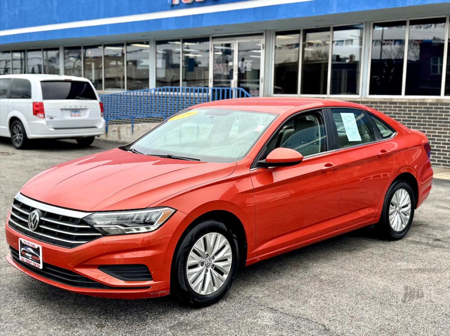 2019 ORANGE Volkswagen Jetta 1.4T SE 8A (3VWC57BU2KM) with an 1.4L L4 DOHC 20V engine, 8A transmission, located at 7600 S Western Ave., Chicago, IL, 60620, (773) 918-3980, 0.000000, 0.000000 - Photo#1