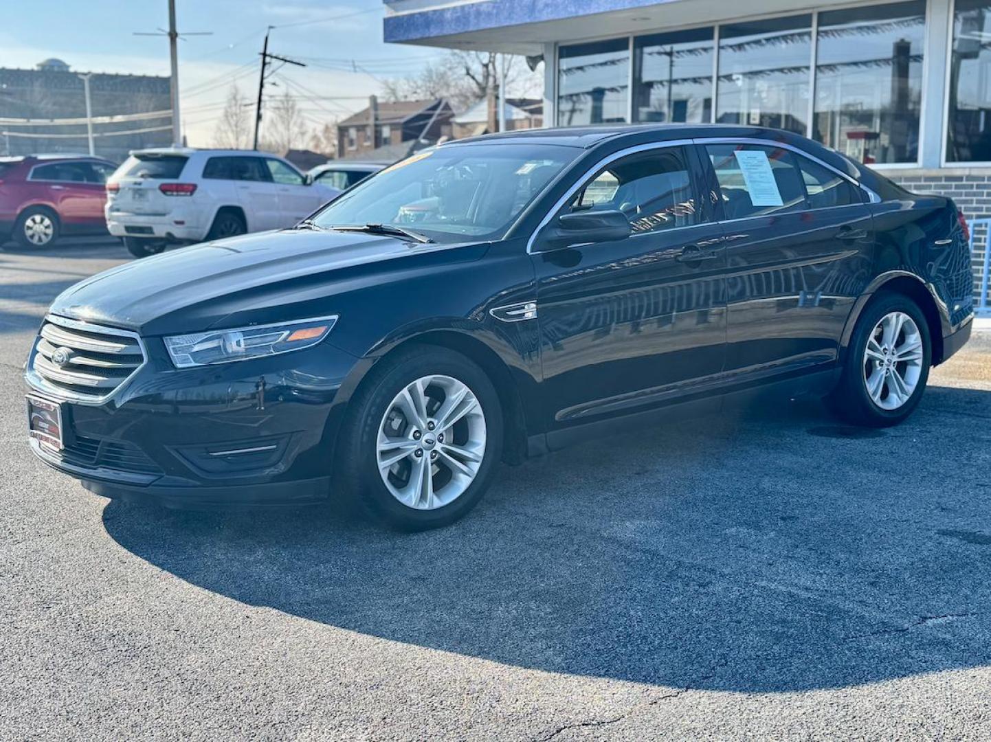 2016 BLACK Ford Taurus SEL FWD (1FAHP2E80GG) with an 3.5L V6 DOHC 24V engine, 6A transmission, located at 7600 S Western Ave., Chicago, IL, 60620, (773) 918-3980, 0.000000, 0.000000 - Photo#2