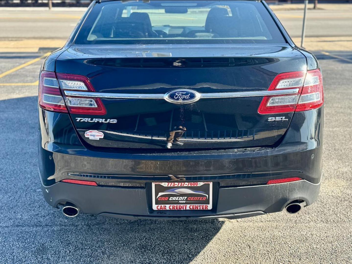 2016 BLACK Ford Taurus SEL FWD (1FAHP2E80GG) with an 3.5L V6 DOHC 24V engine, 6A transmission, located at 7600 S Western Ave., Chicago, IL, 60620, (773) 918-3980, 0.000000, 0.000000 - Photo#3