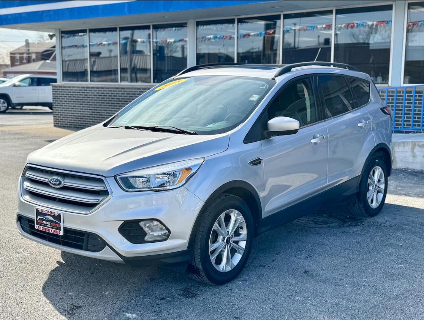 2018 SILVER Ford Escape SE FWD (1FMCU0GD9JU) with an 1.5L L4 DOHC 16V engine, 6A transmission, located at 7600 S Western Ave., Chicago, IL, 60620, (773) 918-3980, 0.000000, 0.000000 - Photo#2