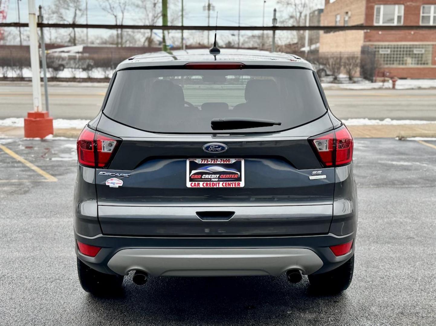 2019 BLACK Ford Escape SE FWD (1FMCU0GDXKU) with an 1.5L L4 DOHC 16V engine, 6A transmission, located at 7600 S Western Ave., Chicago, IL, 60620, (773) 918-3980, 0.000000, 0.000000 - Photo#3