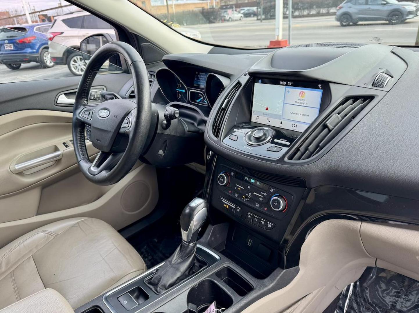 2019 GRAY Ford Escape Titanium FWD (1FMCU0J95KU) with an 2.0L L4 DOHC 16V engine, 6A transmission, located at 7600 S Western Ave., Chicago, IL, 60620, (773) 918-3980, 0.000000, 0.000000 - Photo#7