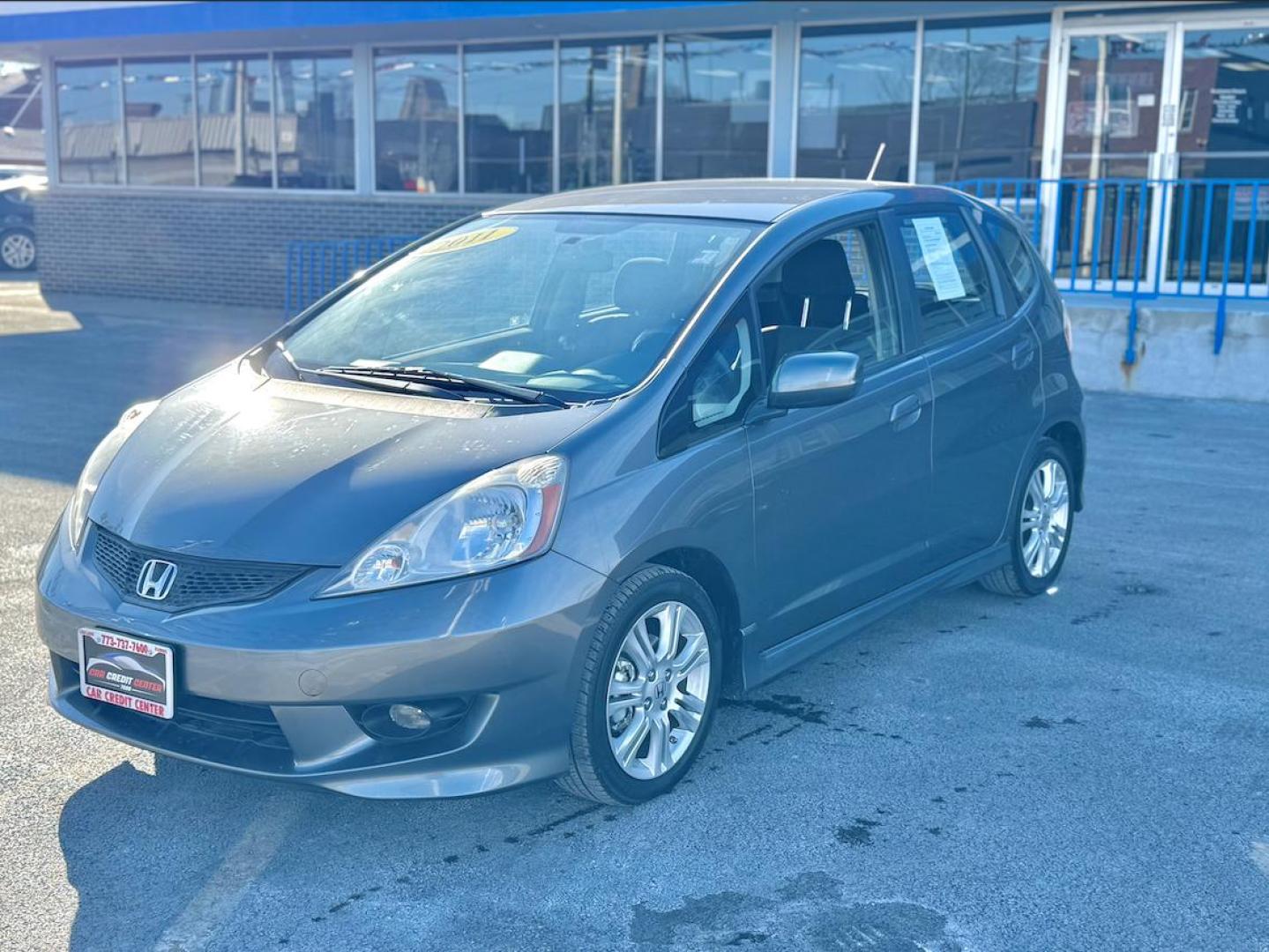 2011 GRAY Honda Fit Sport 5-Speed AT (JHMGE8H54BC) with an 1.5L L4 SOHC 16V engine, 5-Speed Automatic transmission, located at 7600 S Western Ave., Chicago, IL, 60620, (773) 918-3980, 0.000000, 0.000000 - Photo#2